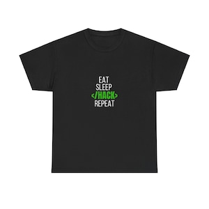 May include: Black t-shirt with white text that reads "Eat Sleep /HACK Repeat" in a code-like font. The word "HACK" is in green.