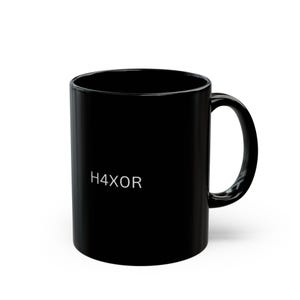 May include: Black ceramic coffee mug with a white inscription that reads "H4XOR".