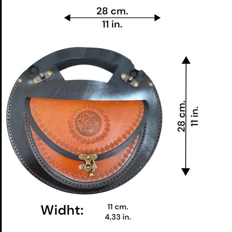 Handmade round crossbody bag crafted from black and brown genuine leather, featuring a Turkish floral motif burned and painted by hand. Elegant, structured, and artisan-made—this boho shoulder purse combines traditional design with practical use. A unique accessory from Türkiye.
