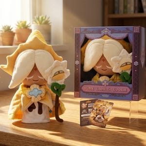 May include: A plush Pure Vanilla Cookie doll with a yellow and white outfit, holding a staff with a flower-shaped head. The doll is displayed next to a box with a similar doll inside and a collectible card.