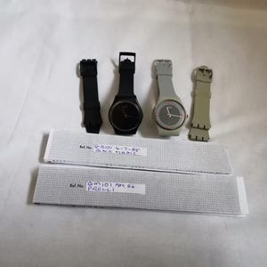 2x vintage swatch wristwatchs. GB101 blackmagic. GM101 Pirelli.