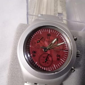 Vintage swatch wristwatchs, yms1006 1997 tomorrow never dies.
