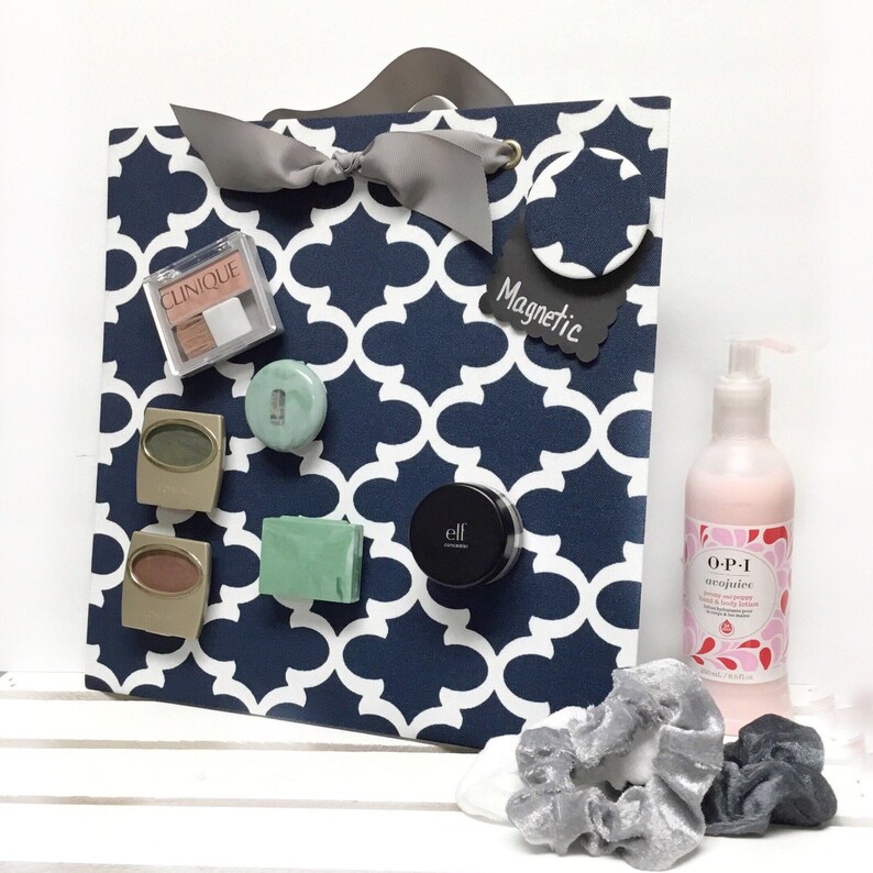 Having a magnetic makeup board can save you so much space. Get the most out of your tiny dorm room space with 14 items that promise better dorm room organization.