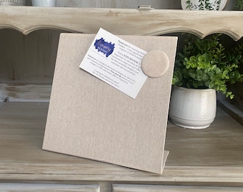 May include: A beige felt board with a white card attached to it with a magnetic button. The card has the text "Thank you for choosing Ree Designs. I truly appreciate your support of small businesses. Every ETSY REVIEW is important to the shop as we continue to improve and offer the best possible designs and customer service possible. Follow us on Instagram @rrydesigns for discounts, new releases, new items, and tag photos of your designs with #rrydesigns. Looking for something else? See the rest of the shop here!"