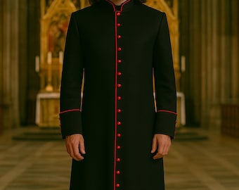 May include: A long black coat with red trim and buttons, worn by a person. The coat has a high collar and is buttoned down the front. The image includes the text "REGENCY ATTIRE". The background is a church interior.