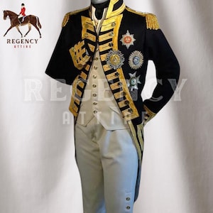 May include: A black and gold military-style jacket with gold trim and buttons. The jacket has a white vest underneath and white pants with gold buttons. The jacket is decorated with gold embroidery and several medals.
