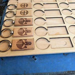 Modello di Jig laser per portachiavi in legno Yinkin