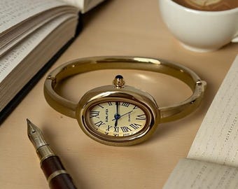 Goldene Luxusuhr, Frauen-Armbanduhr, zierliche elegante Uhr, Vintage-Uhr, Armreifuhr, klassische Uhr, Frauen-Armbanduhr, alte Gelduhr