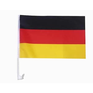 May include: A rectangular flag featuring three horizontal stripes of black, red, and gold. The flag is attached to a white plastic pole with a curved clip at the bottom, designed for mounting onto a vehicle window or similar surface.