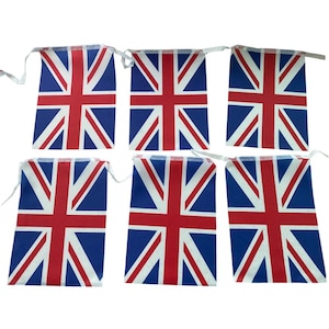 May include: A set of six rectangular pennants featuring the Union Jack flag design in red, white, and blue. Each pennant is attached to a white ribbon string, displaying the iconic cross and diagonal stripe pattern of the United Kingdom flag.