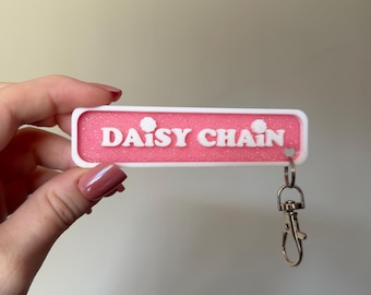 Daisy Chain Fields Music Festival Keychain | Sparkly 3D-Printed Olivia Merch