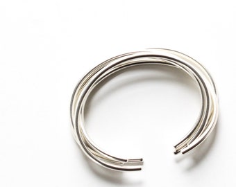 Set of five minimalist silver cuffs with a modern matte finish, sturdy and very striking when stacked together - "Luna Cuffs - set of 5"