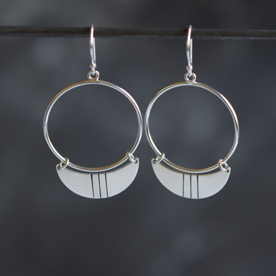 Lightweight Round Silver Earrings With Crescent Dangles That Have