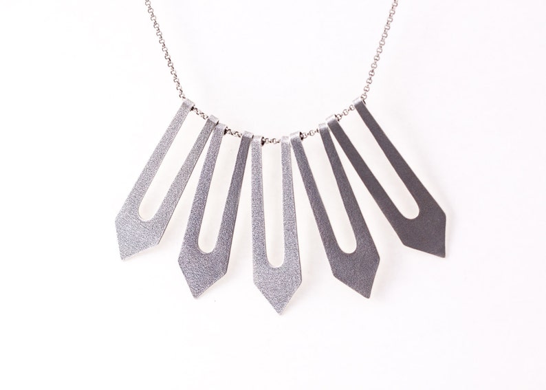 unique style Sterling silver bib style necklace inspired by Moroccan patterns and shapes with a modern spin Silver Soukaina Necklace