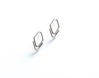 Minimalist and edgy sterling silver stud earrings in a unique arrowhead shape perfect alone or paired w/ other earrings - "Arrowhead Studs"