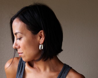 Modern sterling silver hoop earrings patterned with embossed lines and oxidized to a light charcoal finish - "Multiple Paths Earrings"