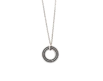 Chic silver necklace, edgy design of 3 separate beaded wire circles nestled within each other to form a striking pendant - "Relic Necklace"