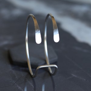 Silver wire cuff, streamlined sterling silver bracelet handmade of sturdy wire formed into a prong shape Small Hammered Tail Cuff image 5