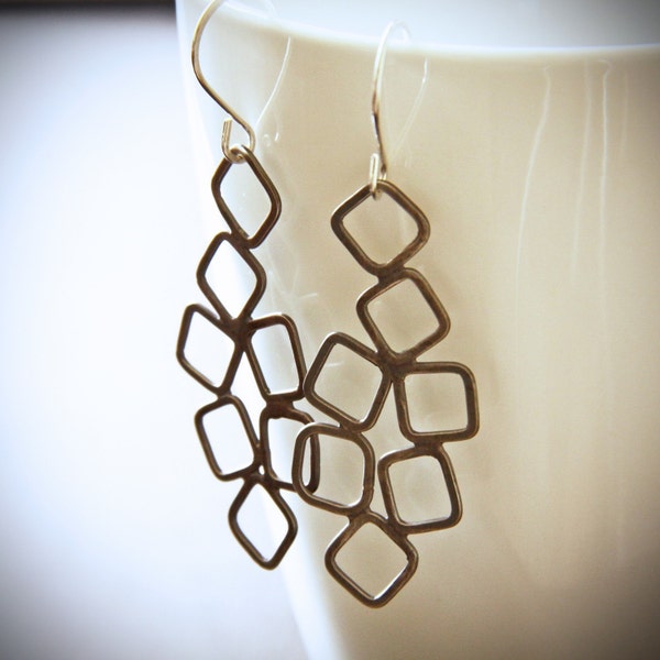 High quality silver earrings handmade by soldering squares to form a matrix for an eyecatching lightweight design - "Honeycomb Earrings"