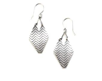 Geometric sterling silver dangle earrings with embossed bold pattern oxidized to bring out detail and show contrast - "Shield Earrings"