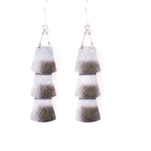 Sterling silver veil earrings of three dramatically connected trapezoid shapes each of which is textured and domed Drape Earrings image 6