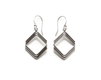 Diamond shaped silver earrings handmade of individually formed wires joined to form a geometric rhombus shape - "Heera Earrings"