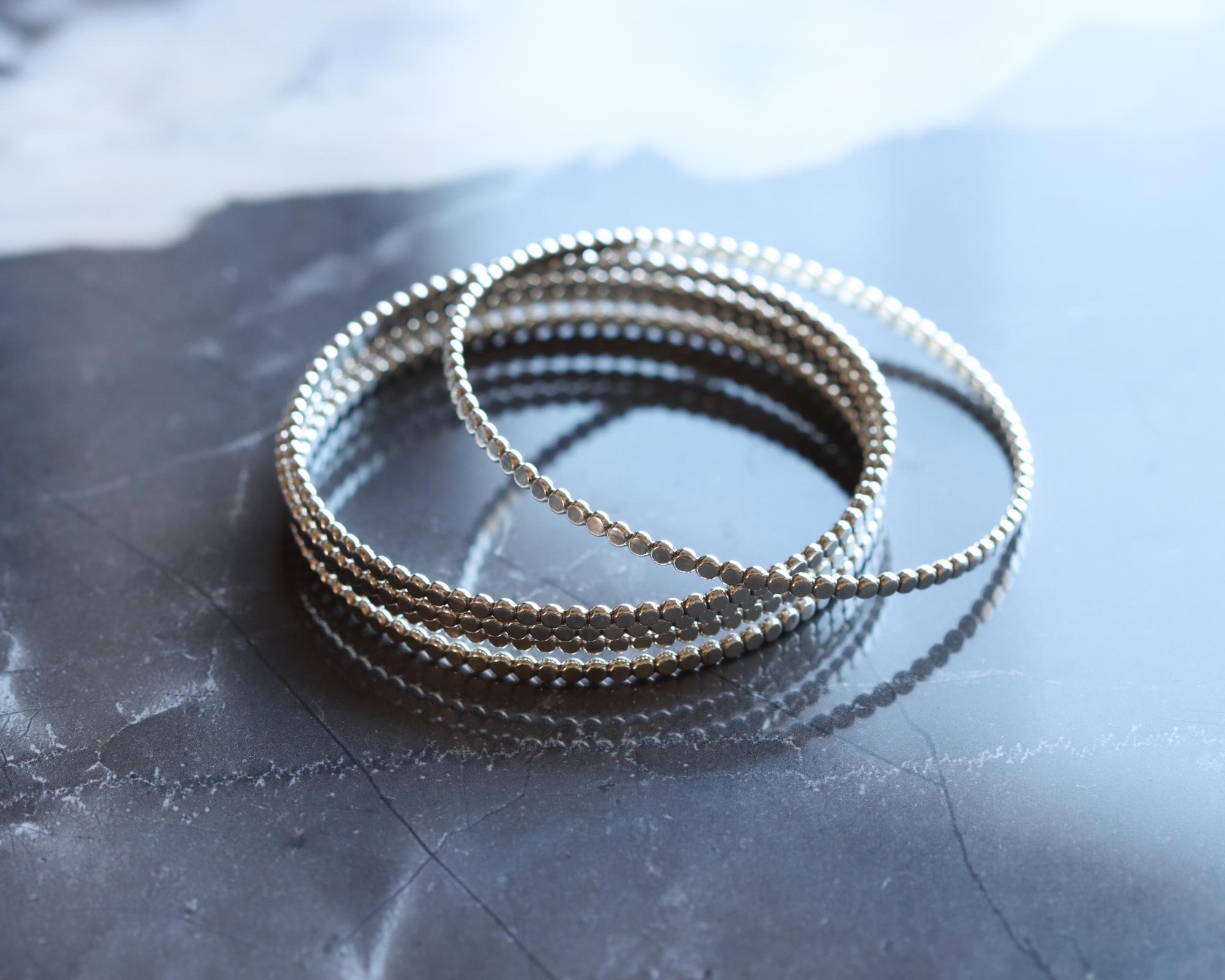 One Bangle, Modern Bracelet Design of Flattened Beaded Wire Oxidized to ...