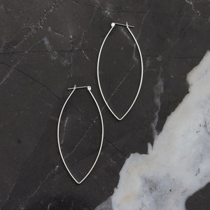 Sturdy lightweight sterling silver hoops designed to stand out with its modern leaf like shape and larger size Porter Hoop Earrings image 3