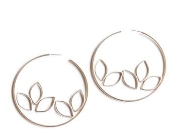 Nature inspired large statement hoop earrings handmade by joining many silver leaf shapes inside a large circle - "Rowan Hoops"