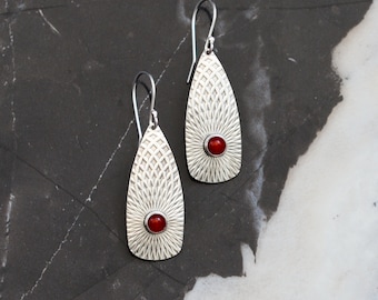 Striking silver earrings with red carnelian stones paired with a long tear drop shape for a gorgeous and unique design - "Llovera Earrings"