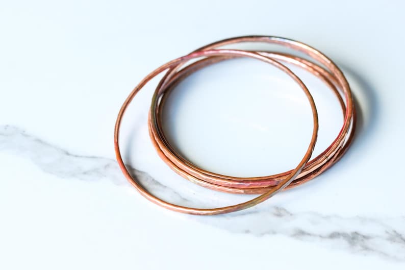 Set of five hammered copper bracelets formed and heat treated for a unique modern look and splash of fall colors - "Desert Bangles - Copper" image 5