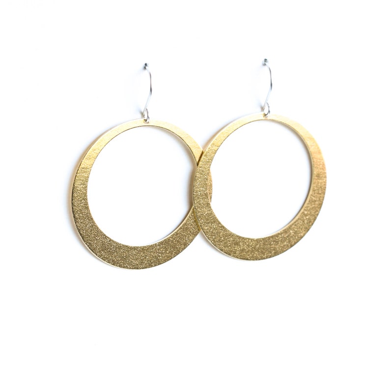 Modern hoop earrings, sleek design and large size of these gorgeous earrings will make a statement anywhere Lunar Hoops in Brass Large image 1