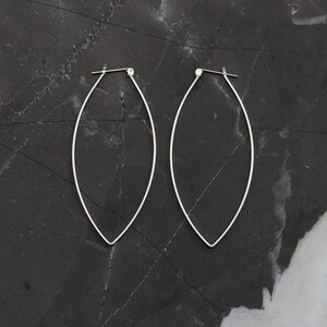 Sturdy lightweight sterling silver hoops designed to stand out with its modern leaf like shape and larger size Porter Hoop Earrings image 8