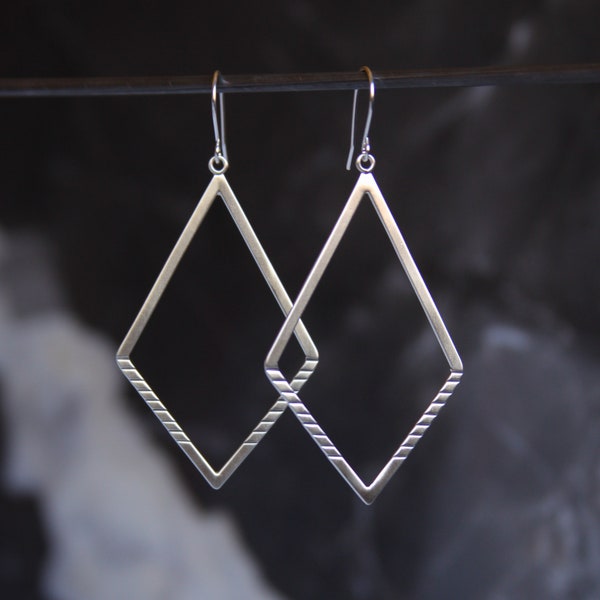 Long geometric pair of diamond shape sterling silver dangle earrings w chisel marks, lightweight and visually striking - "Arcadian Earrings"