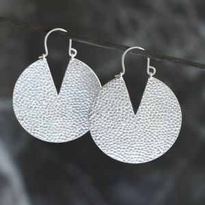 Bold and round silver earrings with hammered texture and contrasting V shaped cutout, a unique hassle-free design - "Iya Earrings - Large"