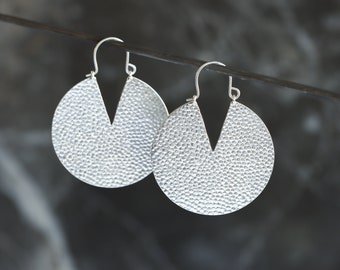Bold and round silver earrings with hammered texture and contrasting V shaped cutout, a unique hassle-free design - "Iya Earrings - Large"