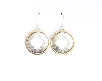 Round dangle sterling silver earrings in a Moroccan style with a hand sawed cutout framed by a thin brass circle washer - "Farah Earrings"