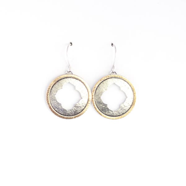 Round dangle sterling silver earrings in a Moroccan style with a hand sawed cutout framed by a thin brass circle washer - "Farah Earrings"