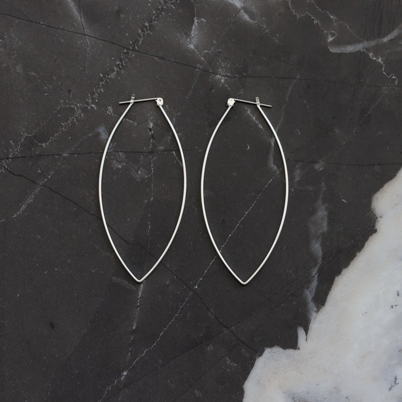 Sturdy lightweight sterling silver hoops designed to stand out with its modern leaf like shape and larger size Porter Hoop Earrings image 5