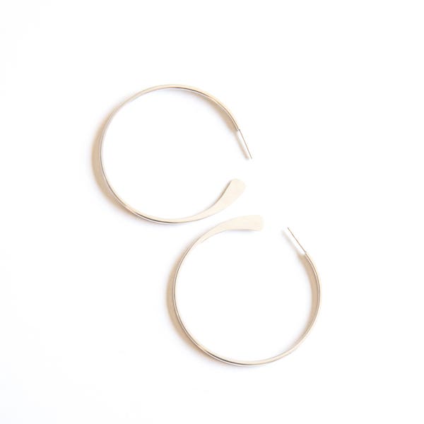 Everyday classic hoop earrings handmade of sturdy silver wire with hammered ends for a sleek modern look - "Hammered Tail Hoops - medium"