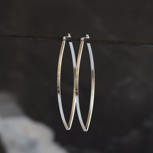 Sturdy lightweight sterling silver hoops designed to stand out with its modern leaf like shape and larger size Porter Hoop Earrings image 4