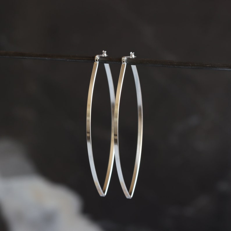 Sturdy lightweight sterling silver hoops designed to stand out with its modern leaf like shape and larger size Porter Hoop Earrings image 4