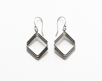 Diamond shaped silver earrings handmade of individually formed wires joined to form a geometric rhombus shape - "Heera Earrings"