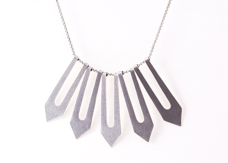 unique style Sterling silver bib style necklace inspired by Moroccan patterns and shapes with a modern spin Silver Soukaina Necklace