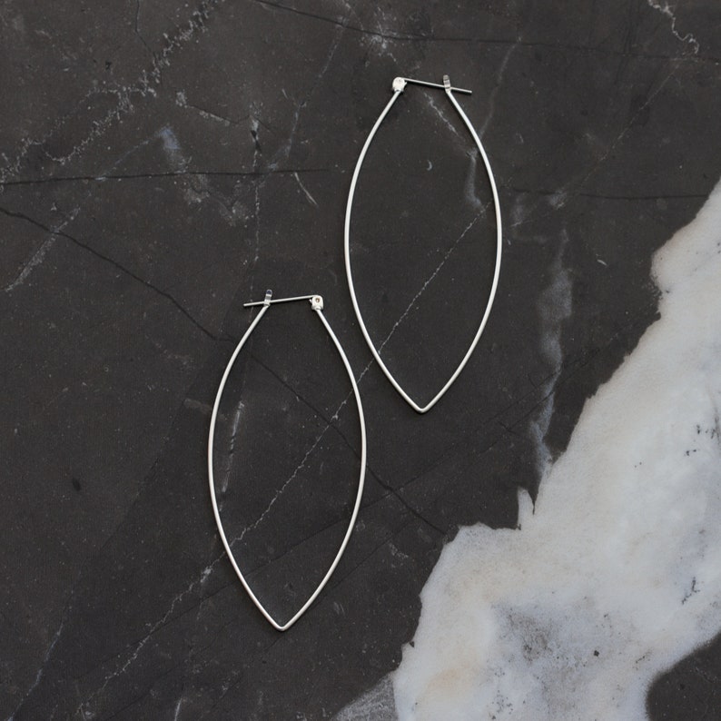 Sturdy lightweight sterling silver hoops designed to stand out with its modern leaf like shape and larger size Porter Hoop Earrings image 6