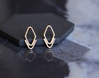 Gold Arrowhead studs - Minimalist and edgy 14K gold stud earrings in a unique arrowhead shape perfect alone or paired w/ other earrings