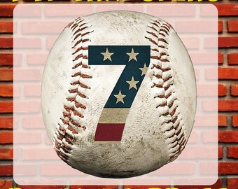 May include: A white baseball with red, white, and blue stars and stripes, with the number 7 on it. The baseball is on a brick background with the text "DTF TRANSFERS" at the top and "READY TO PRESS" at the bottom.