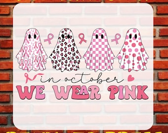 May include: A DTF transfer sheet featuring four ghosts with pink patterns, including breast cancer ribbons, leopard print, checkers, and polka dots. The text reads: in october WE WEAR PINK. Pink ribbons and a heart are included in the graphic design.