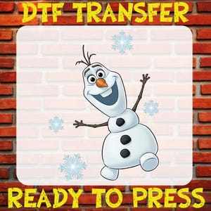May include: A DTF transfer featuring Olaf, a cheerful snowman character, with a carrot nose, twig arms, and black button details. The design includes snowflakes and the text "READY TO PRESS".