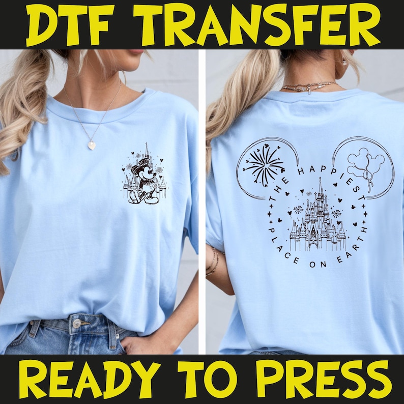 May include: Light blue t-shirt featuring a black and white graphic of Mickey Mouse in front of a castle on the front. The back of the shirt has a castle design with the text "The Happiest Place on Earth". The words "DTF TRANSFER" and "READY TO PRESS" are in yellow and black.